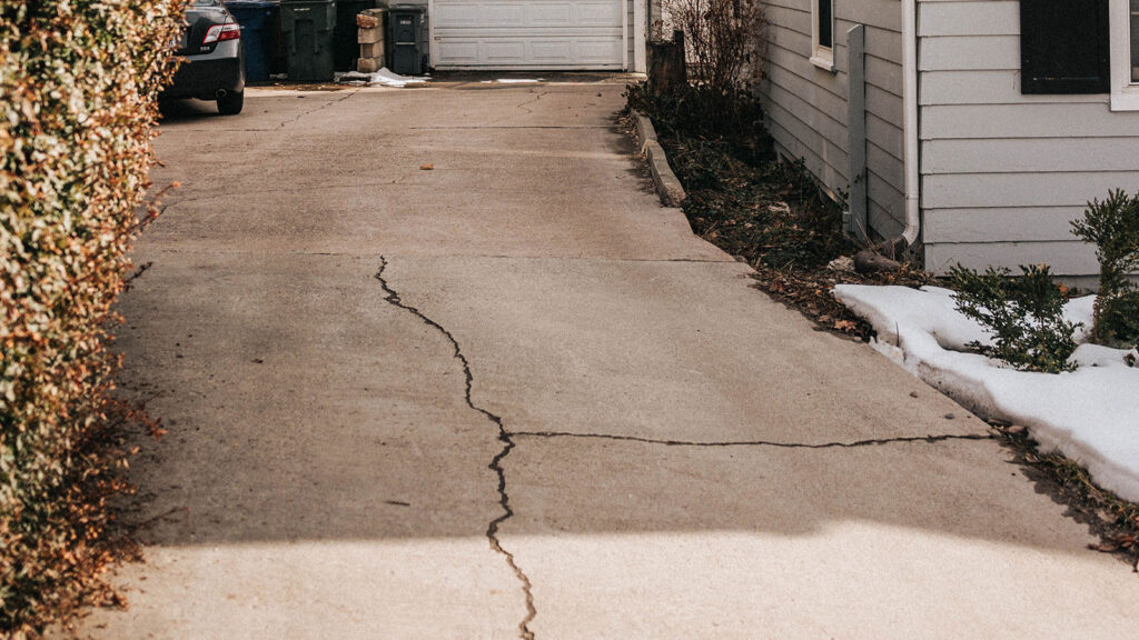 Why Your Driveway Edge Starts Breaking Apart After the Frost Is Gone